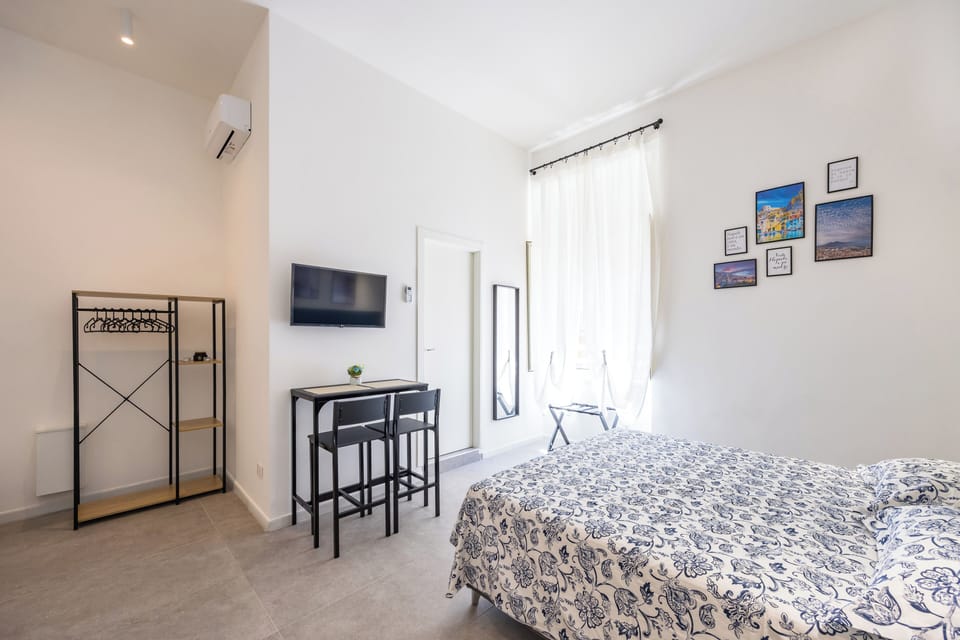 Superior Quadruple Room, City View | Individually decorated, individually furnished, desk, laptop workspace