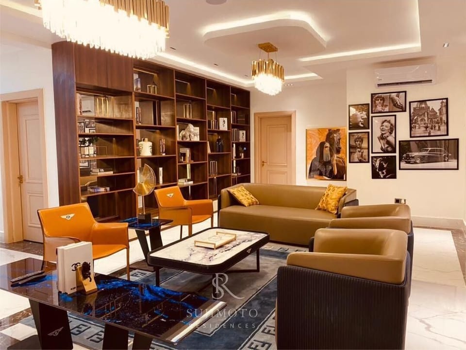 Luxury Apartment | Living area | Flat-screen TV