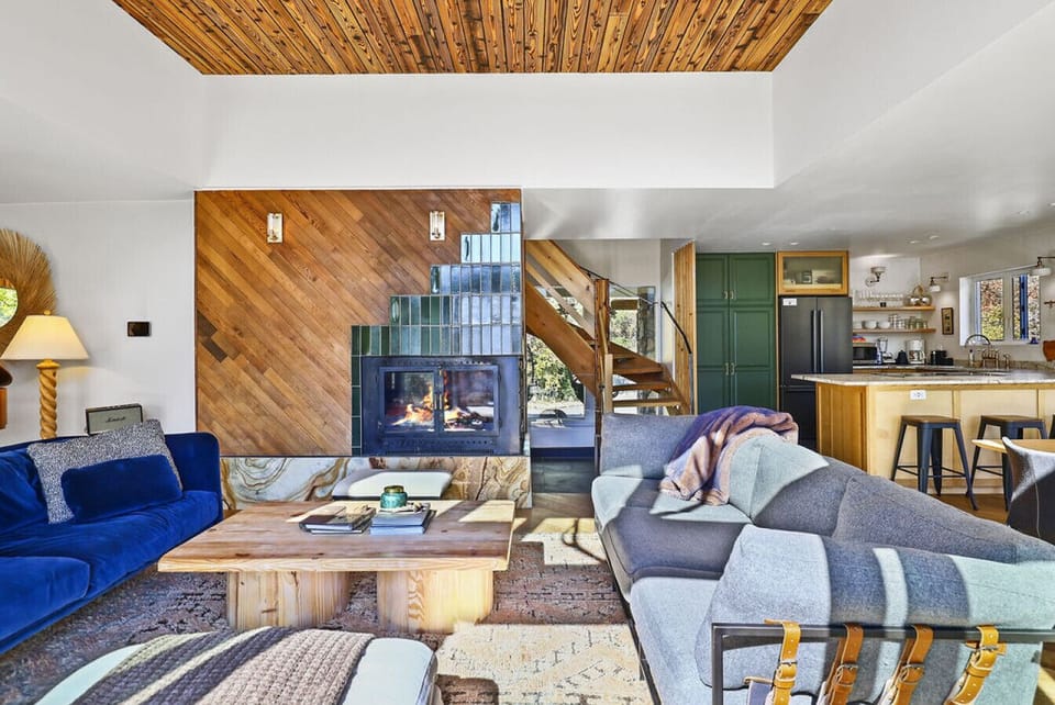 Bright, fun living room with multiple hang out spots