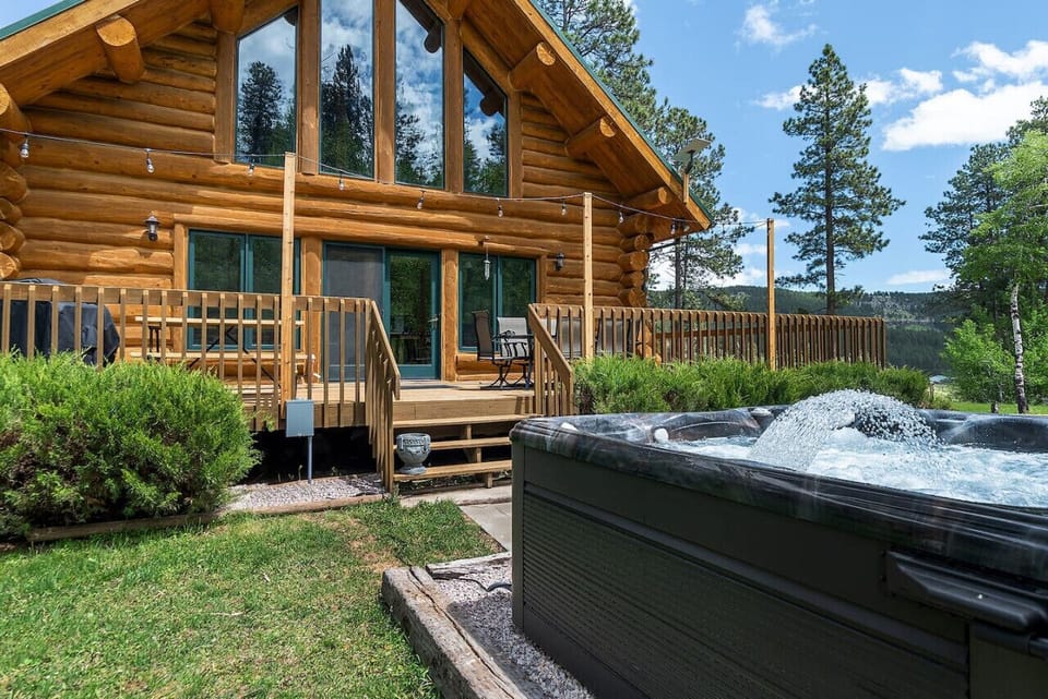 The hot tub features a stunning design that seamlessly blends with the patio`s aesthetic.