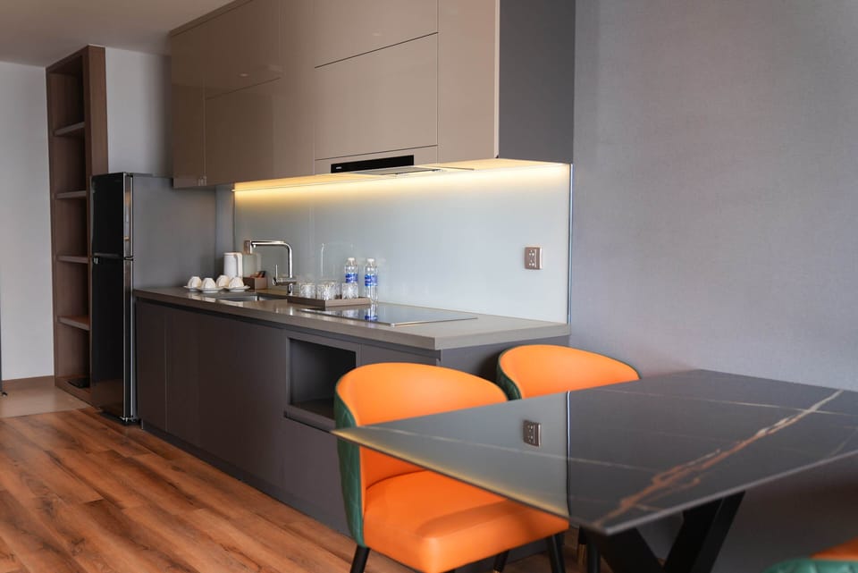 Two Bedroom Suite City View | Private kitchen | Fridge