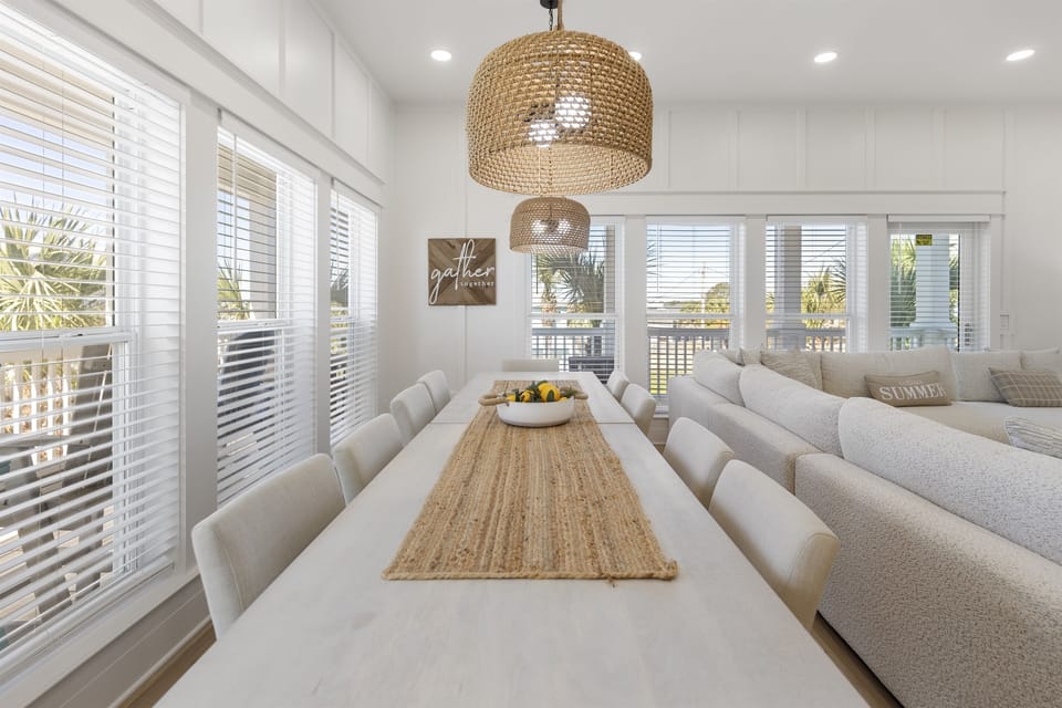 Gather around your spacious dining table where coastal charm meets modern comfort, perfect for memorable meals with loved ones.