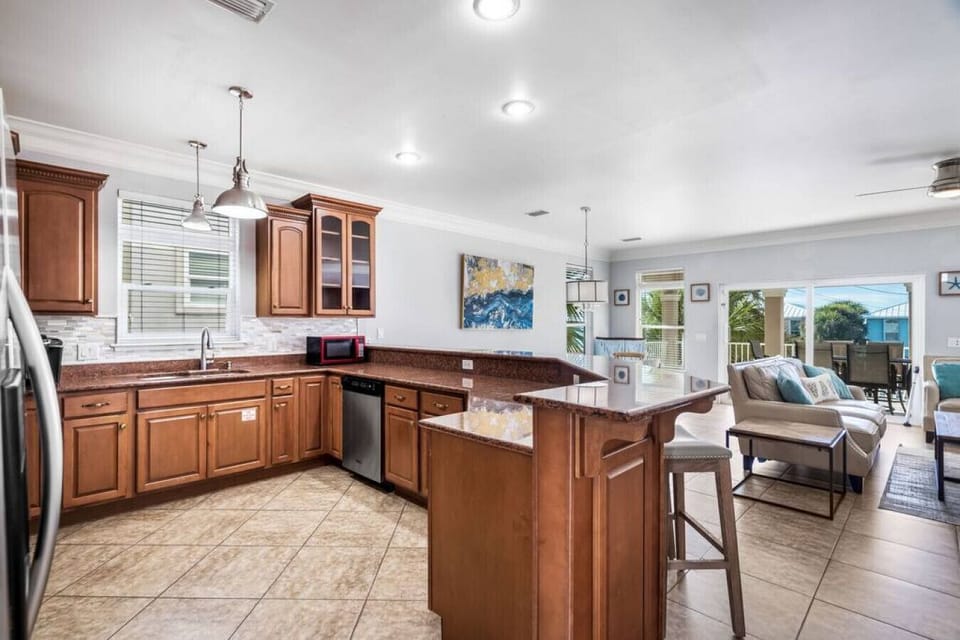 Your spacious open kitchen flows seamlessly into the living area, perfect for cooking together and sharing meals.