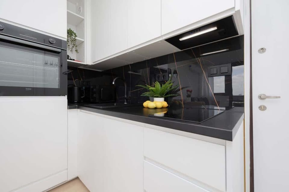 Kitchenette with a kettle.