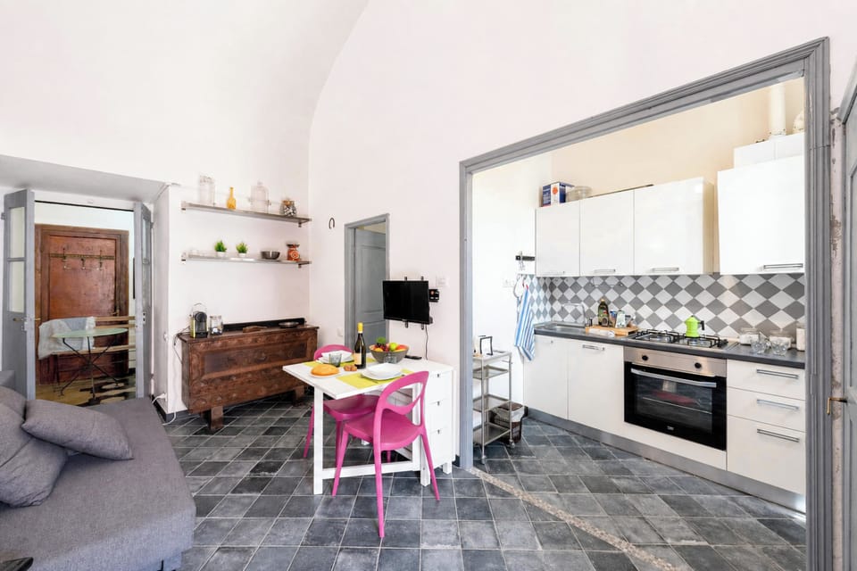 Family Apartment, 2 Bedrooms, Terrace (Il Bivacco Historic Terrace Apartment) | Living area | Flat-screen TV
