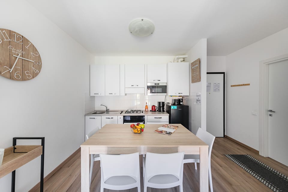 Apartment | Private kitchen | Full-size fridge, microwave, oven, stovetop