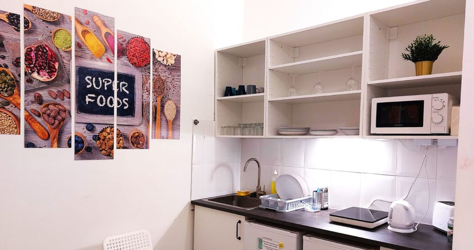 Basic Twin Room | Shared kitchen | Shared fridge, microwave, espresso maker, coffee/tea maker