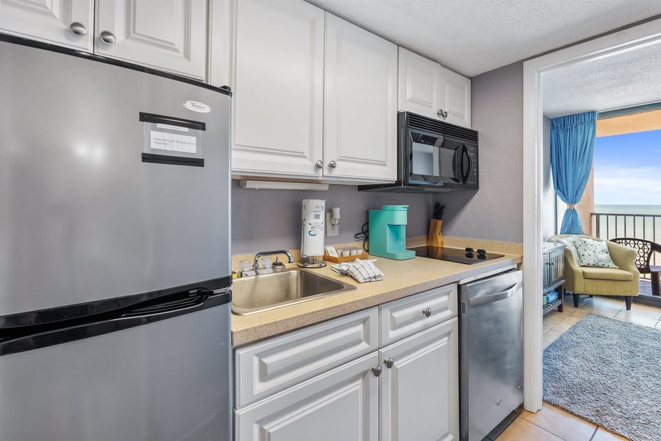 Cook like a pro in this fully equipped kitchen, complete with modern appliances for all your culinary needs