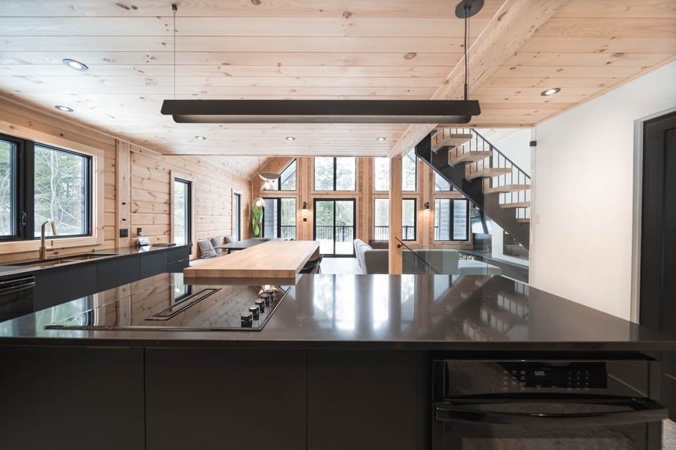 Open area dining room and living room-"Le Mitik Kanata Tremblant, Amherst, QC" (1)