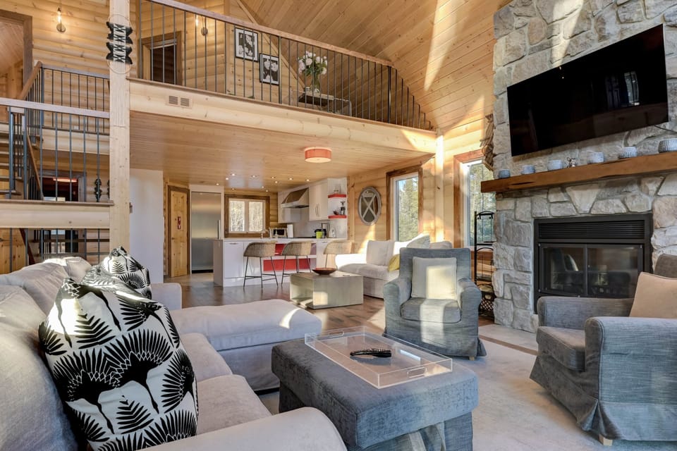 Living room with kitchen in the background