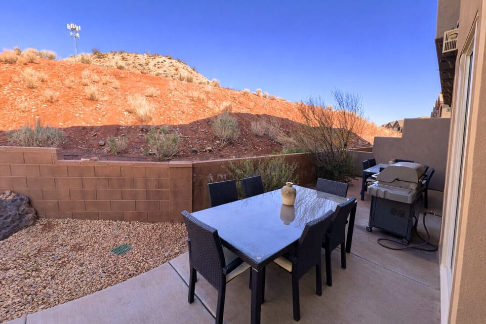 A Back Patio w/ Grill & Seating