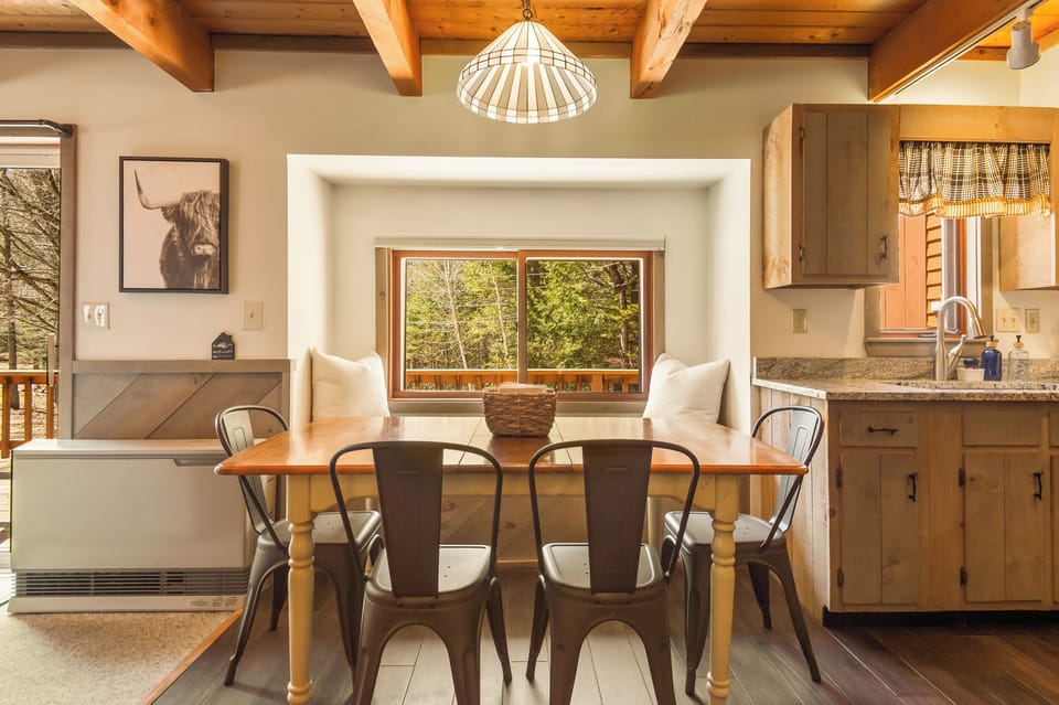 Dining area and there's another table with chairs off the living room