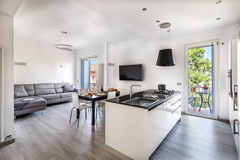 Apartment, Balcony, Pool View | Living area | 35-inch TV with digital channels
