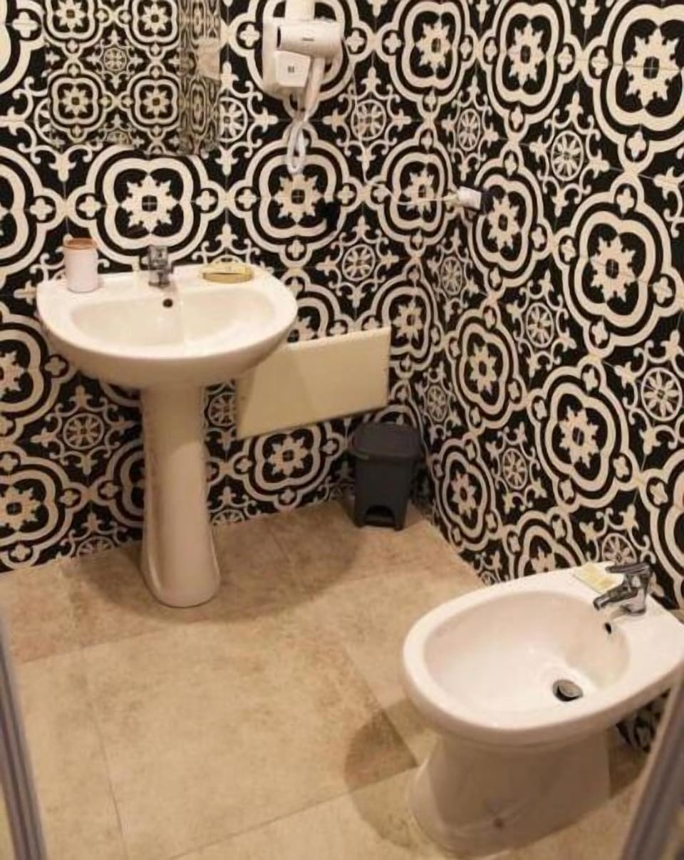 Comfort Room, City View | Bathroom | Hair dryer, bidet
