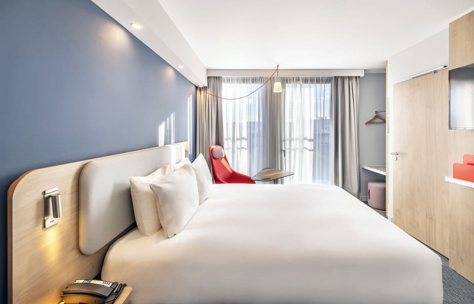 Select Comfort beds, laptop workspace, blackout drapes, soundproofing