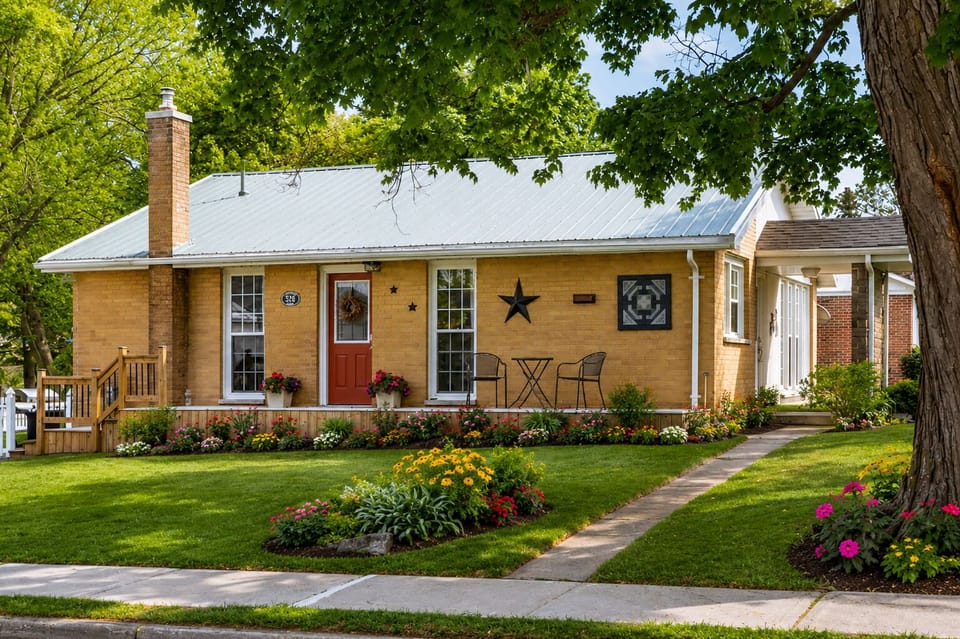House Front - Charming Picton home on a peaceful street within walking distance of downtown restrura