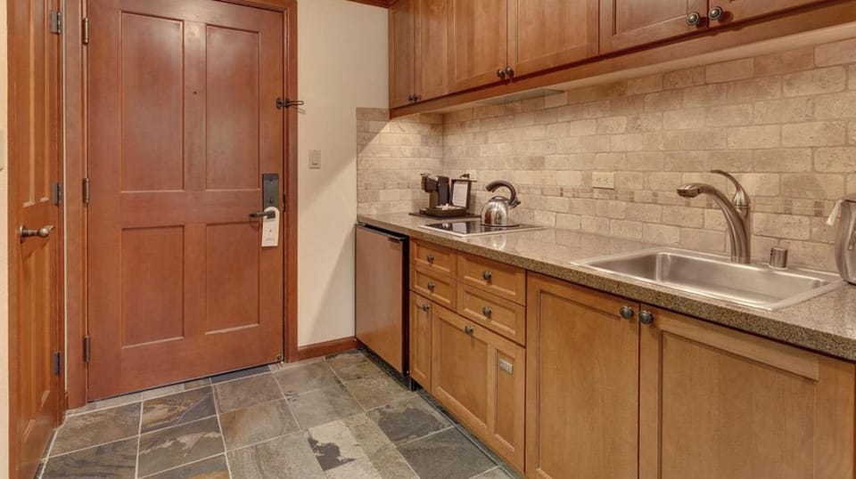 1/2 kitchen in the condo.