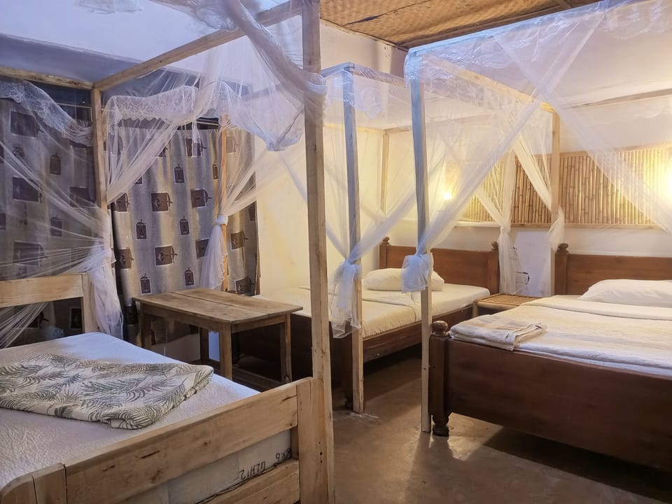 Family Cottage, 2 Bedrooms, Balcony, Garden View | Desk, laptop workspace, iron/ironing board