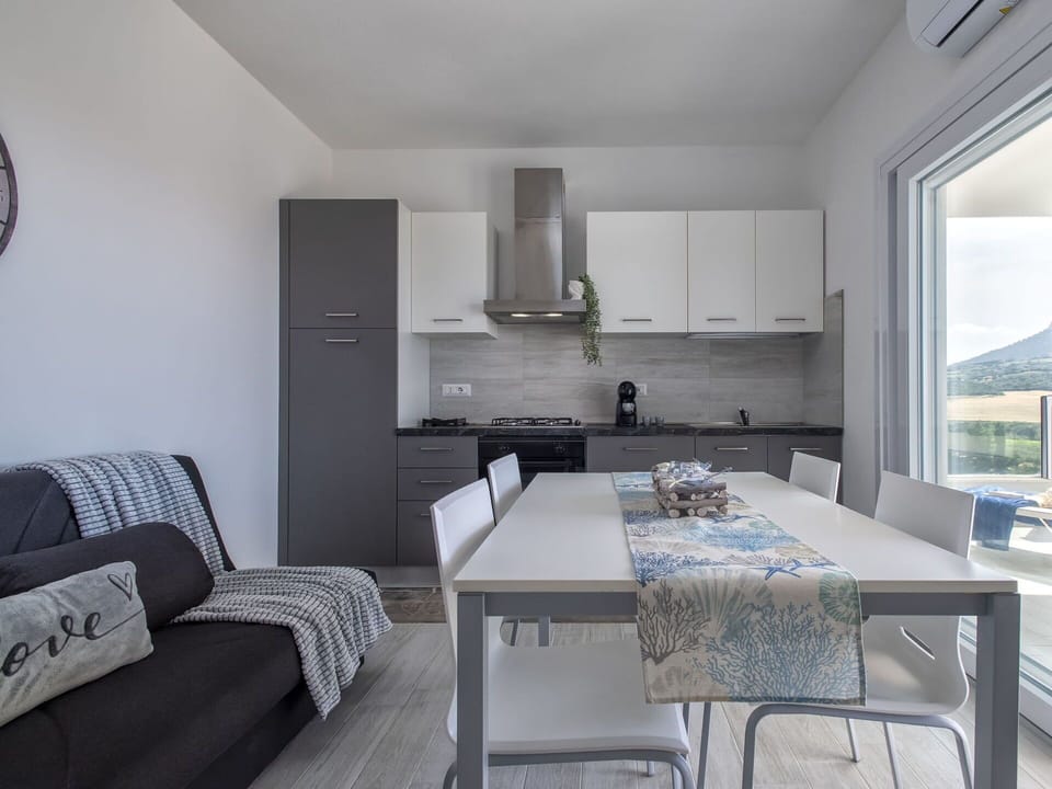Furniture, Countertop, Table, Cabinetry, Wood, Kitchen, Couch, Flooring, Tap