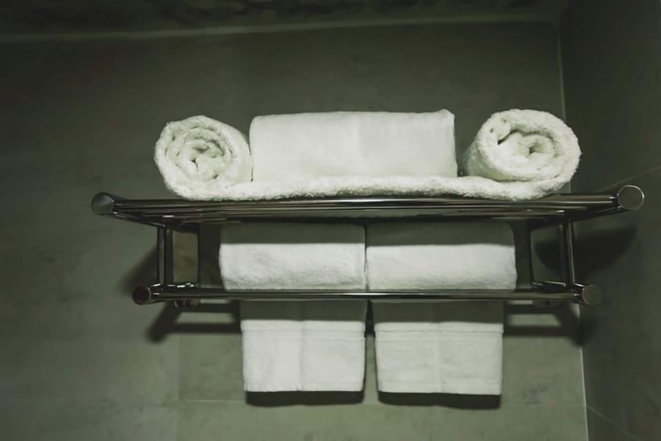 Deluxe Triple Room, Lake View | Bathroom | Shower, rainfall showerhead, designer toiletries, hair dryer