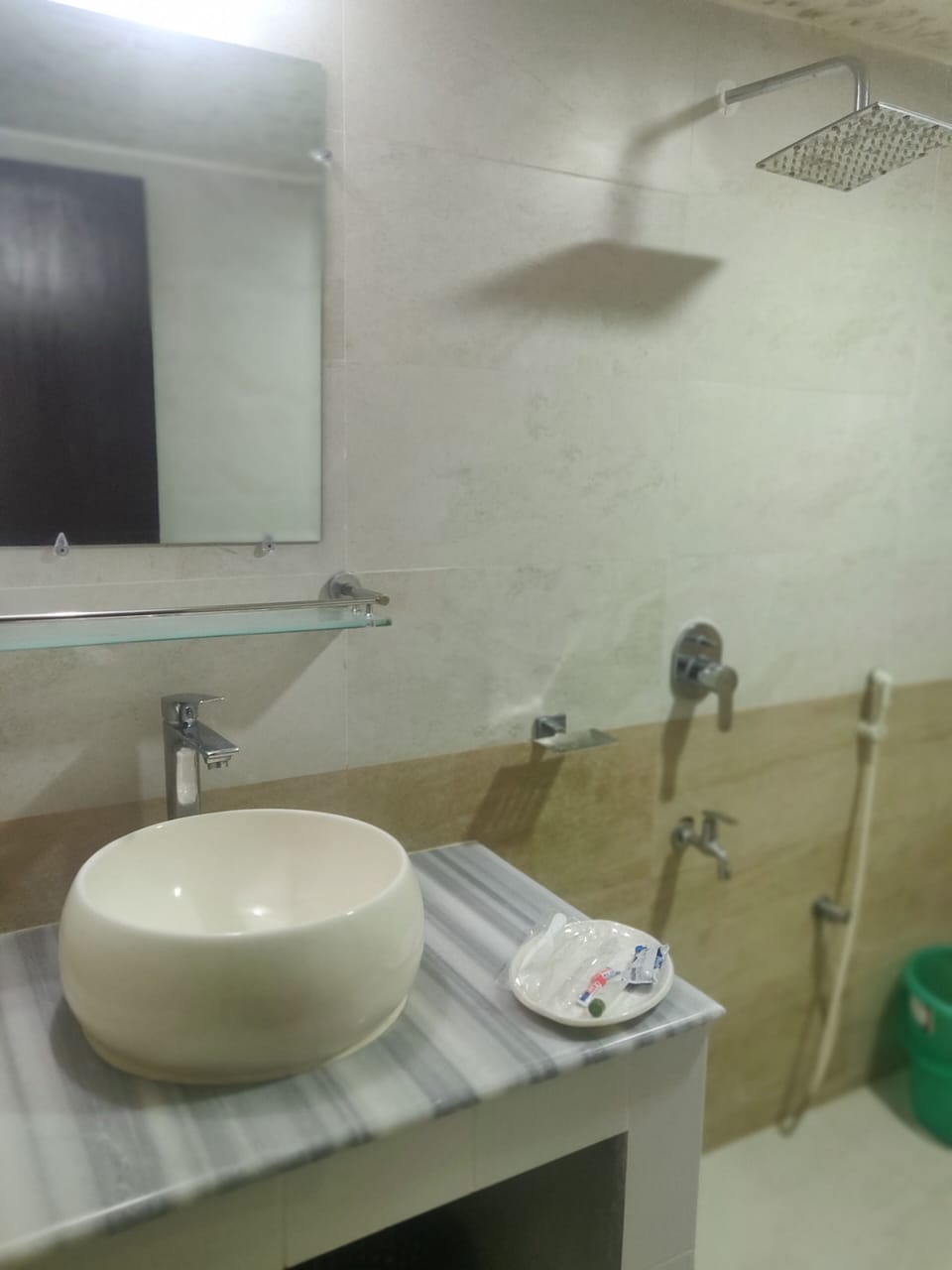 Shower, rainfall showerhead, designer toiletries, hair dryer