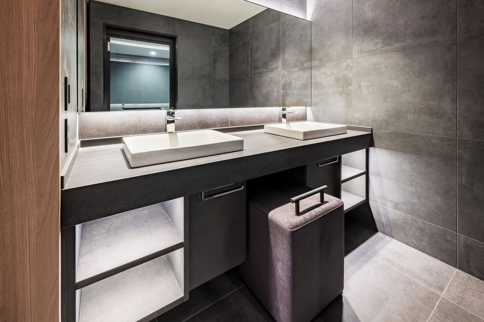 Separate tub and shower, free toiletries, hair dryer, slippers