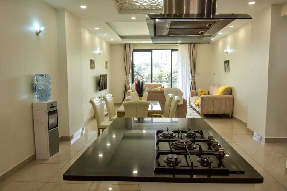 Executive Apartment, Balcony, City View | Living area | 32-inch Smart TV with digital channels