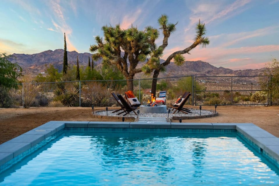 Pool, fire pit, Joshua trees, and a sky that puts on a show every night. This is desert living at its finest.