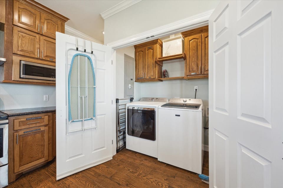 Maytag washer and dryer are available for use during your stay, with built-in cabinetry for storage.