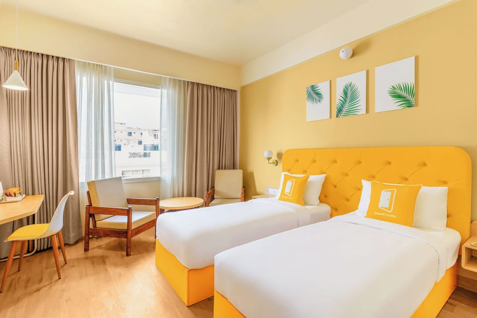 Deluxe Twin Room | In-room safe, desk, laptop workspace, iron/ironing board