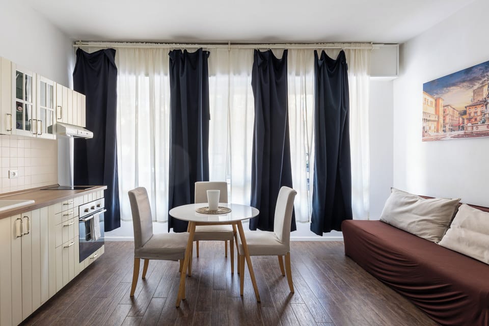 Apartment | Living area | 30-inch TV with satellite channels