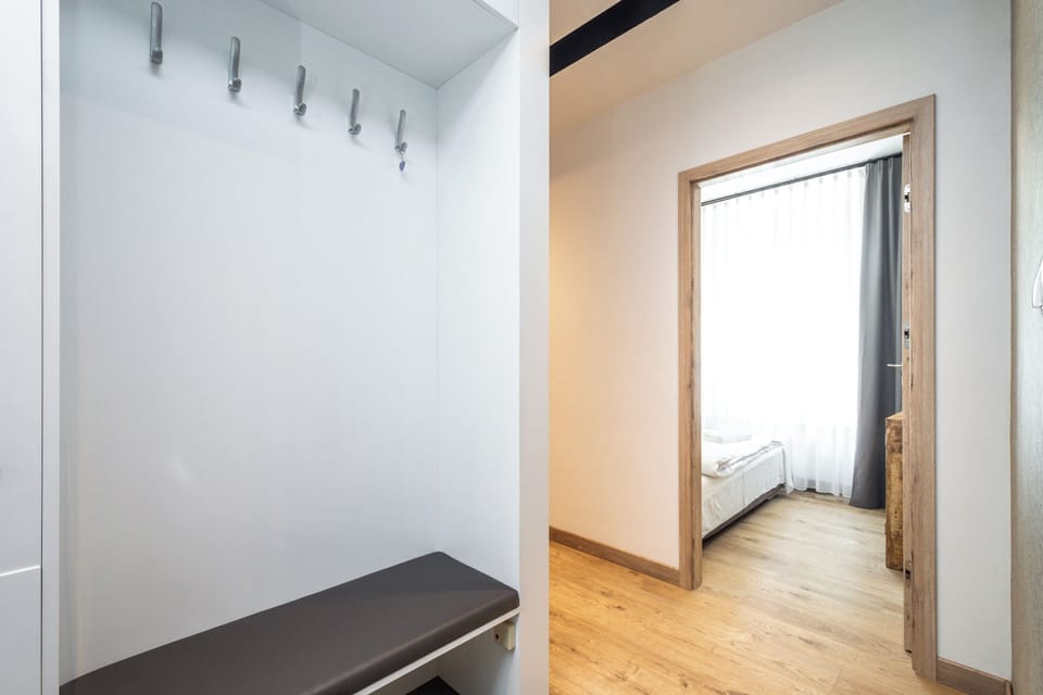 City Apartment | Living area | 27-inch flat-screen TV with digital channels, streaming services