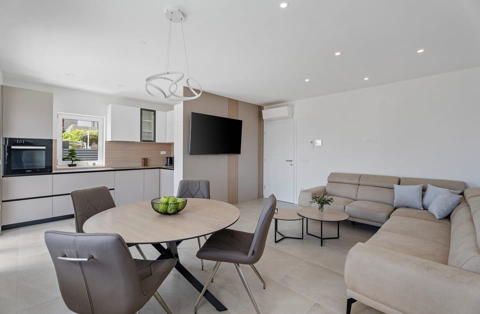 Open concept living area and a balcony with sea views