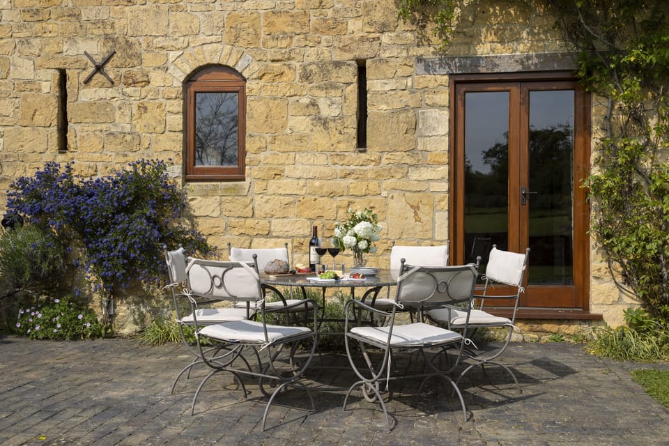 Relax on the front patio after a day exploring the local area