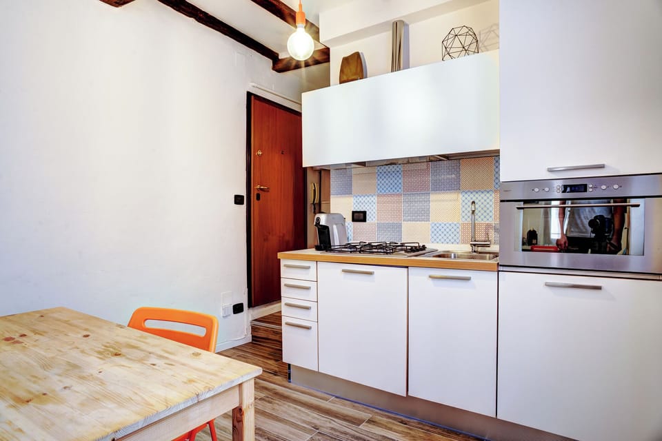 Apartment | Private kitchen | Espresso maker, dining tables