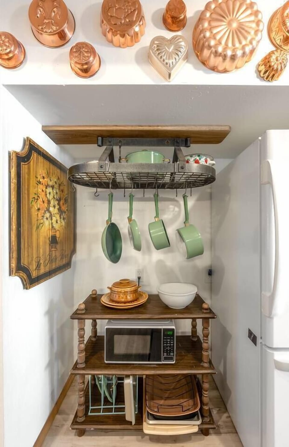 We've got all your cooking covered! There is a stove, microwave & full set of pots and pans. 
