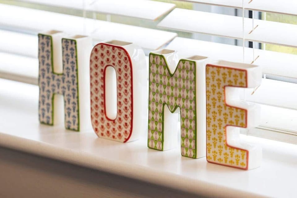 - Decorative HOME letters bring a personal cozy touch  
- Fun detail that adds character to your living space  
- Warm welcoming vibe perfect for Airbnb stays  
