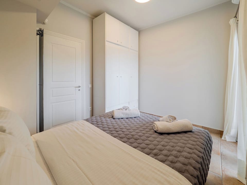 "Discover the perfect balance of comfort and style in our thoughtfully designed bedroom space."