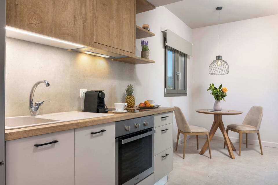 "Designed for your convenience – prepare meals or enjoy a quiet breakfast in this stylishly functional kitchen."