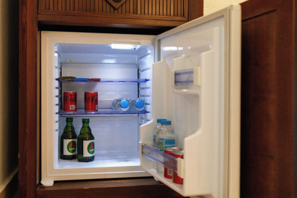 "Well-stocked mini fridge with complimentary essentials to make you feel at home."
