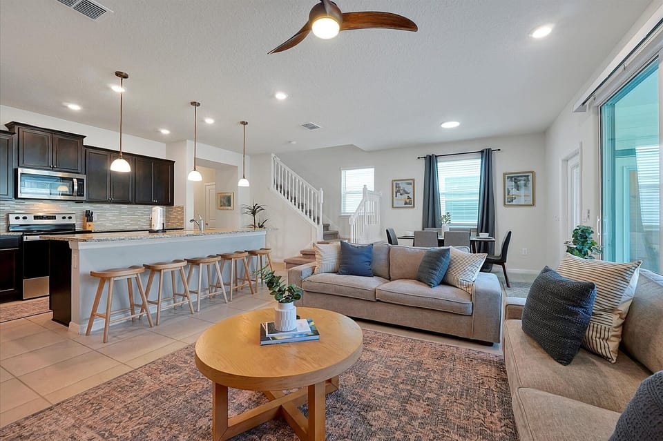 Integration of the living room, kitchen and dining room.