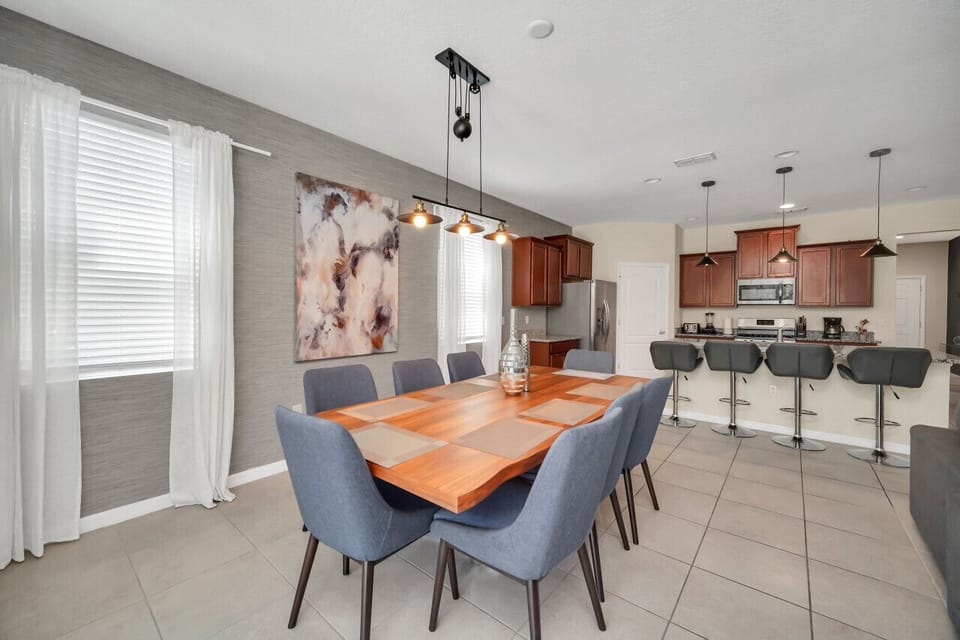 Enjoy meals just steps from the kitchen in this cozy, connected dining space