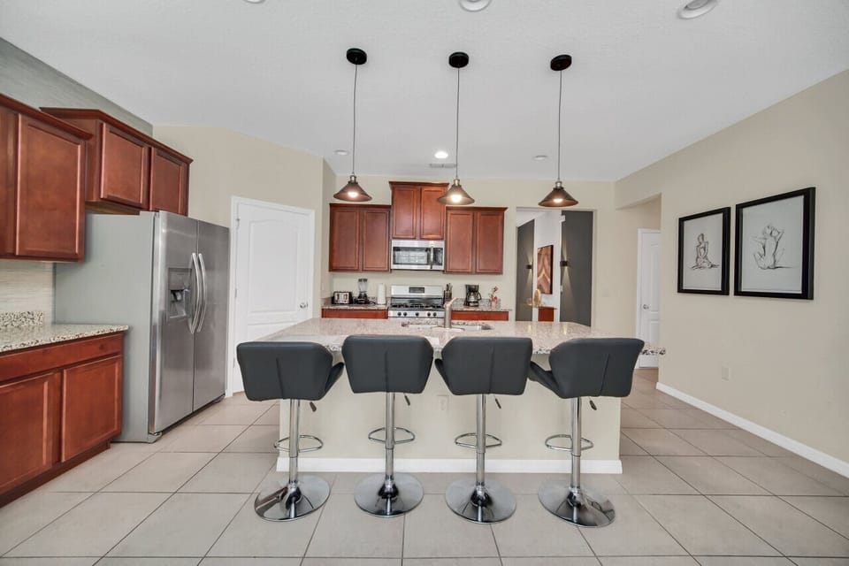 A warm, inviting counter space for casual breakfasts and evening chats.