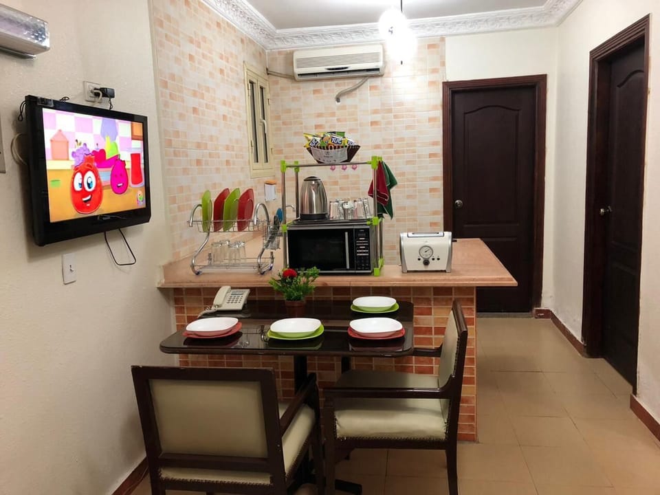 Fridge, microwave, coffee/tea maker, electric kettle