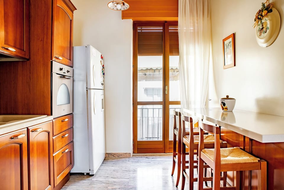 Apartment, Beach View | Private kitchen | Electric kettle, highchair, dining tables