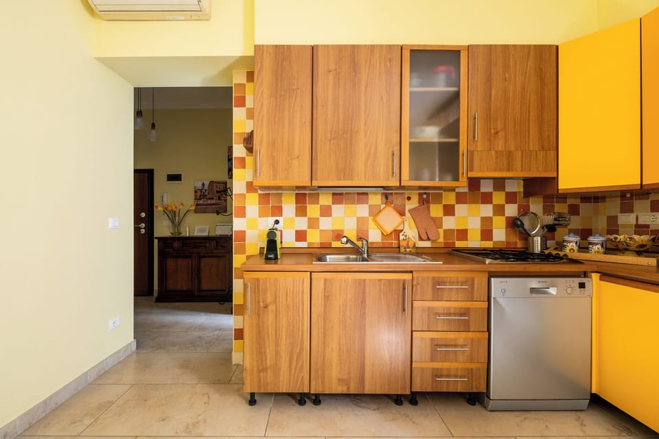 Apartment | Private kitchen | Espresso maker, electric kettle, dining tables