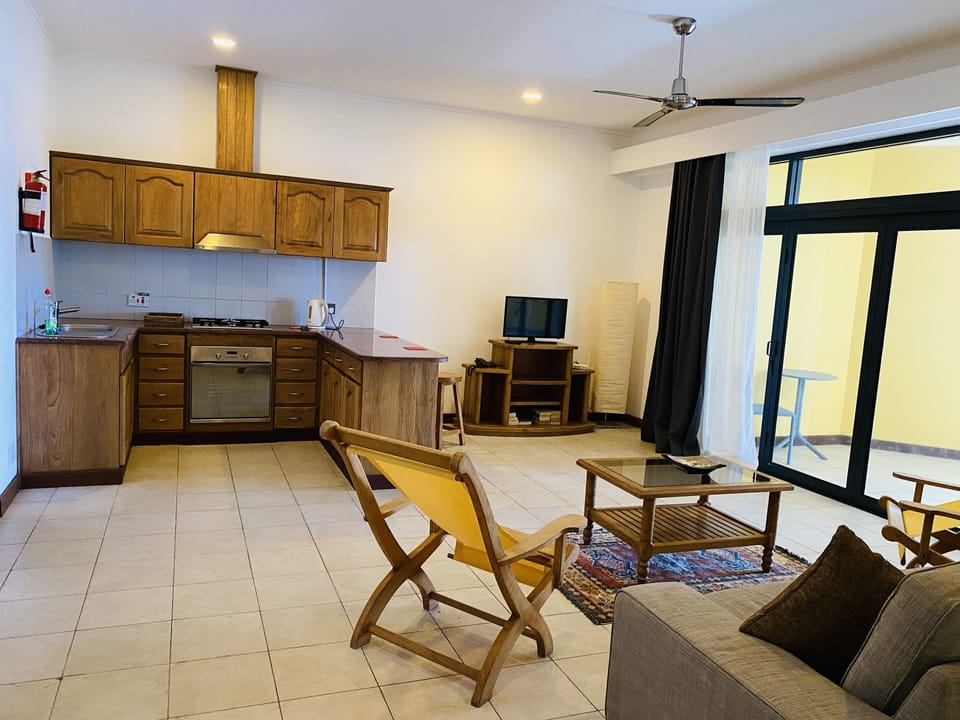 Basic Apartment | Living area | 24-inch LED TV with cable channels, TV