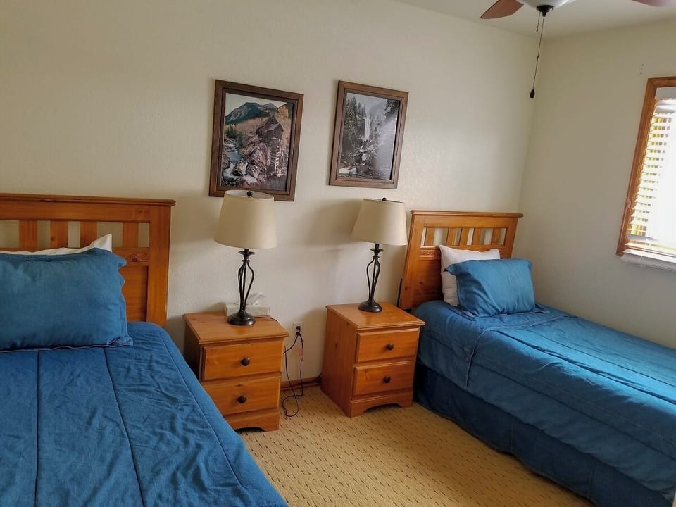 Condo, Multiple Beds, Jetted Tub, Mountain View (C03) | 3 bedrooms, individually decorated, individually furnished, bed sheets