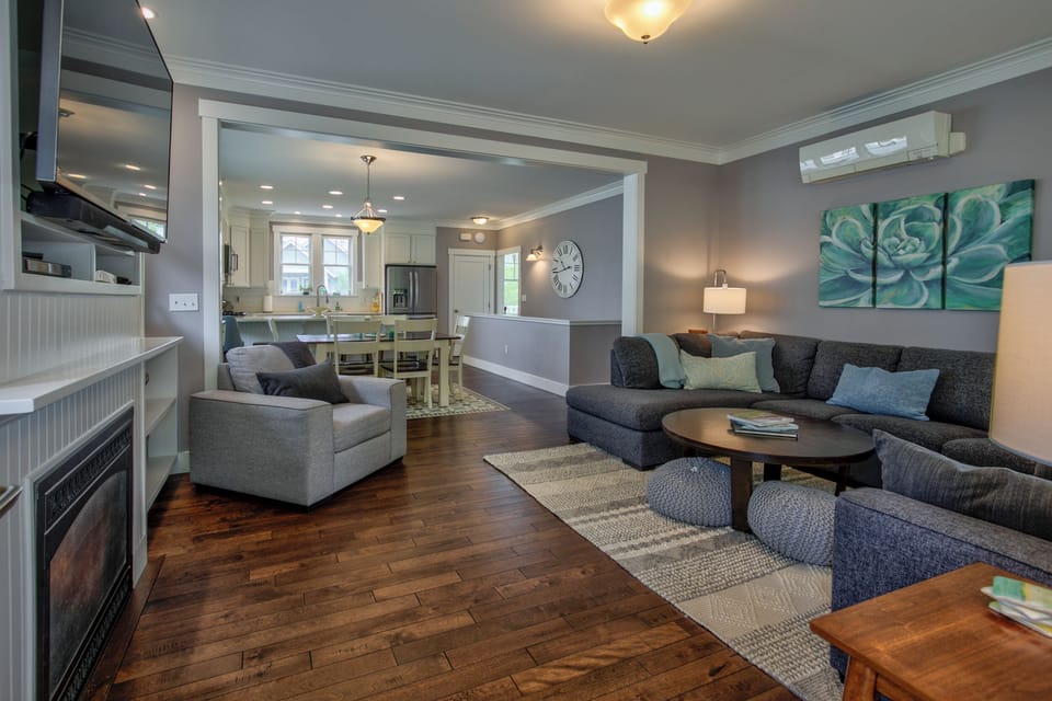 Dining room is next to the living room of the house. 