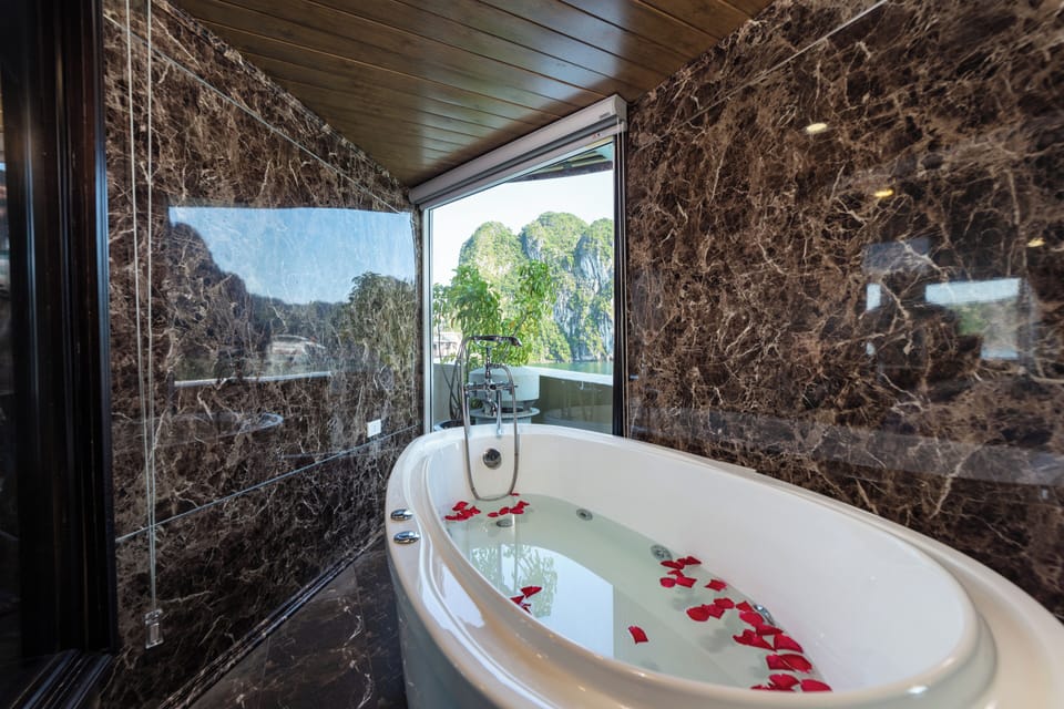 Royal Suite with Terrace and Bathtub | Bathroom | Hydromassage showerhead, designer toiletries, hair dryer, bathrobes